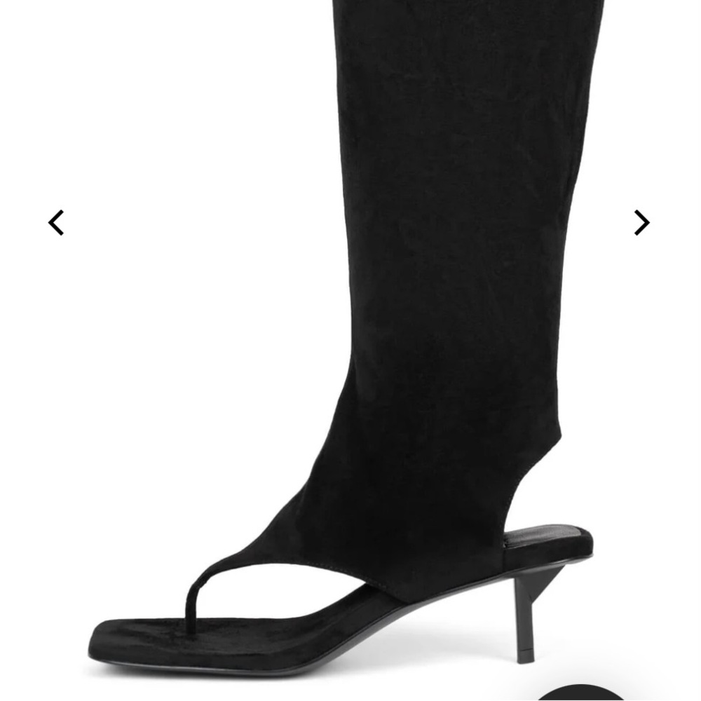 Kitten heel knee-high thong boot
size 7 
Opening Suede upper 
Zipper closure